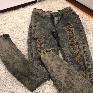 Distressed acid washed jeans